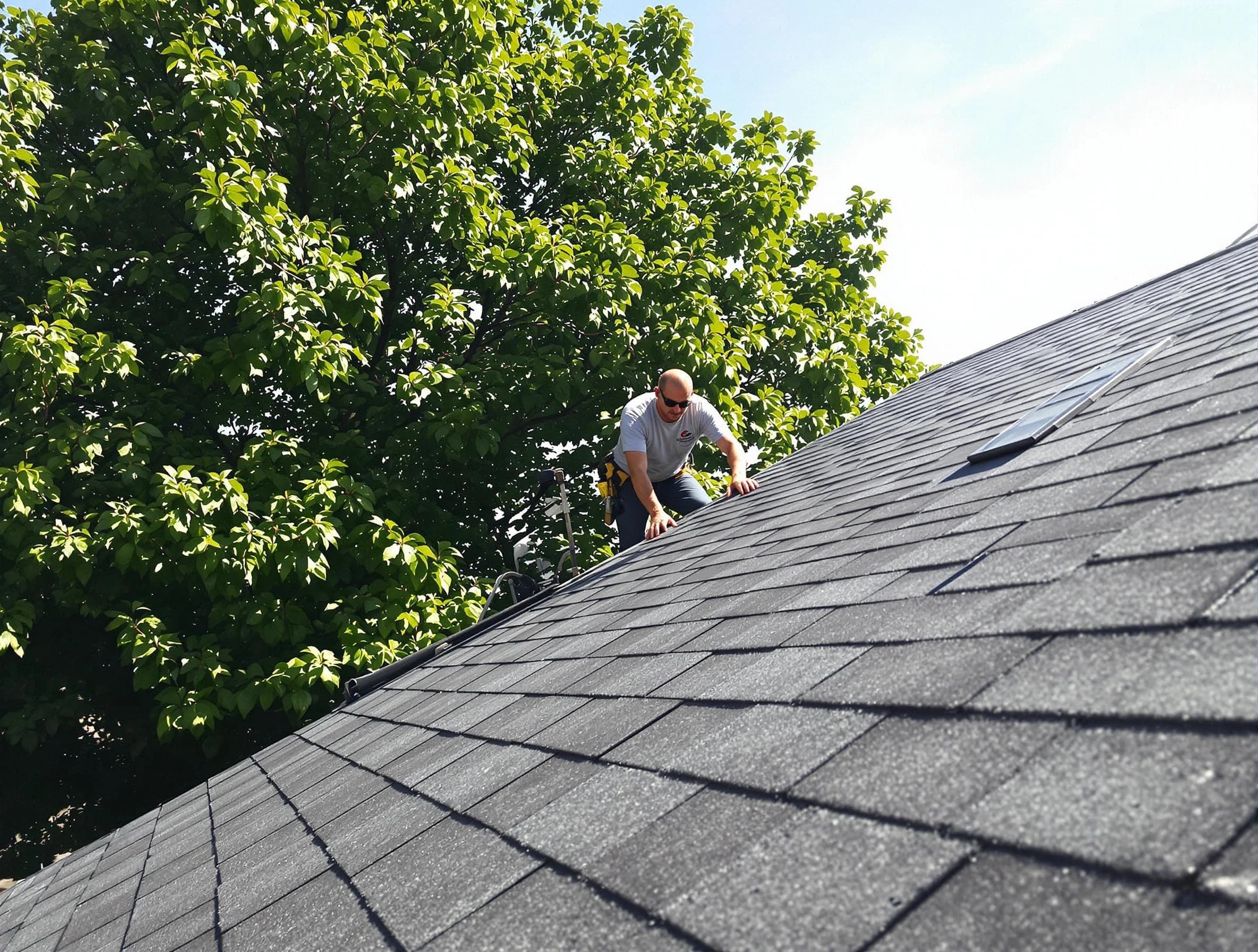 Certified roofers from Brecksville Roofing Company working in Brecksville, OH